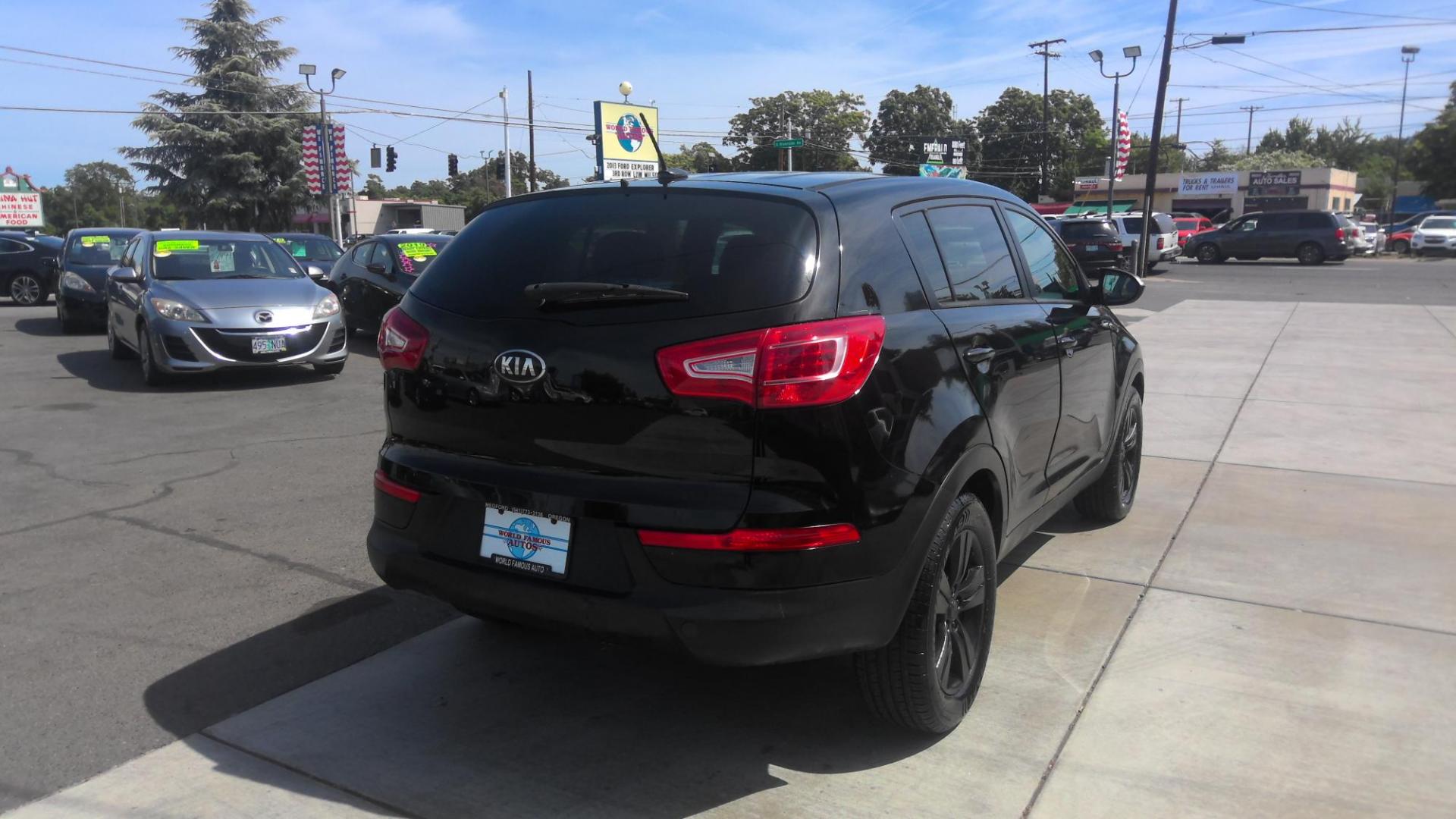 2013 BLACK Kia Sportage LX AWD (KNDPBCA2XD7) with an 2.4L V6 DOHC 24V engine, 6-Speed Automatic transmission, located at 502 S. Riverside Avenue, Medford, OR, 97501, (541) 773-3136, 42.322803, -122.867477 - Photo#2