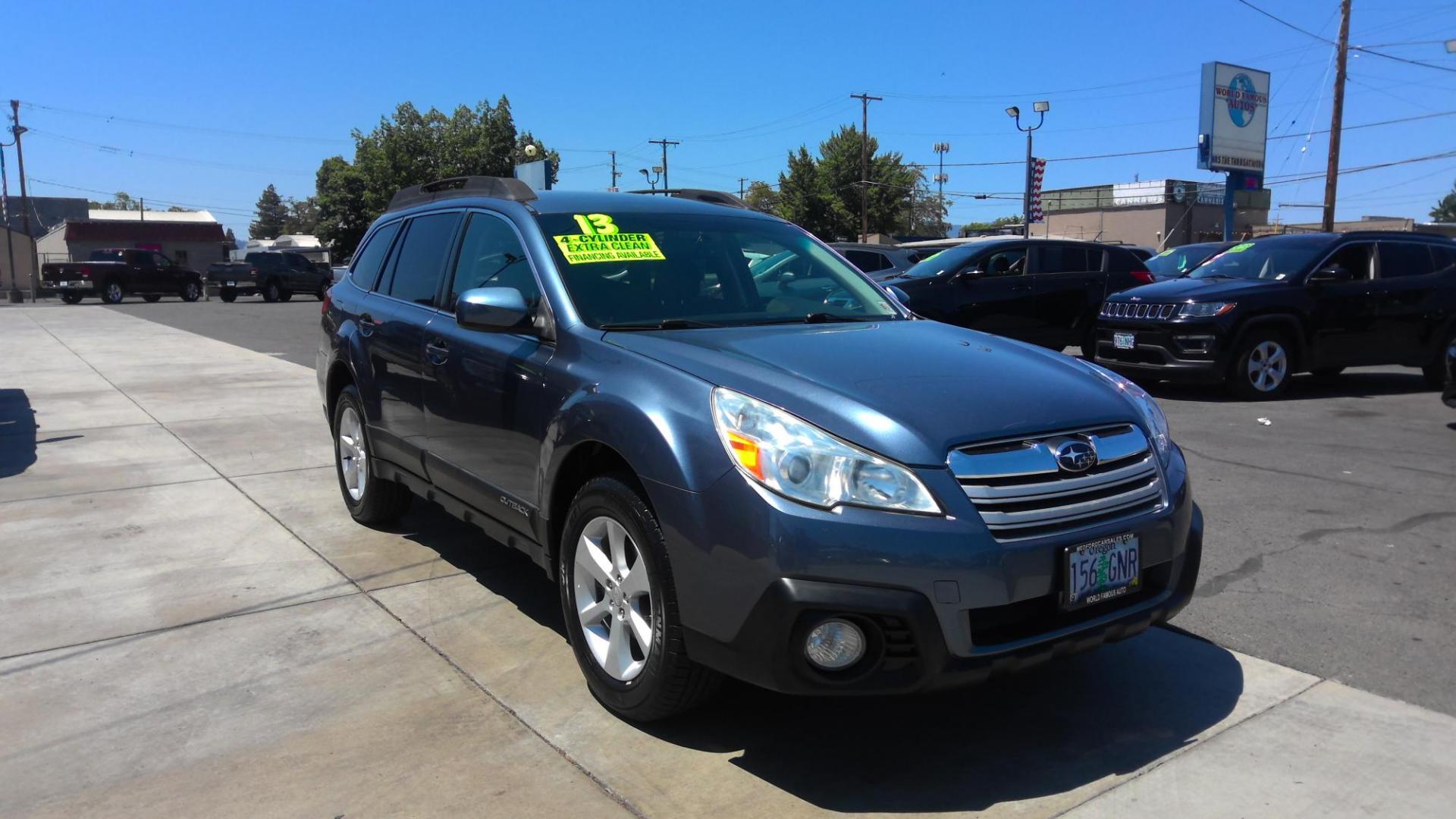 2013 BLUE Subaru Outback 2.5I Premium (4S4BRBCC2D1) with an 2.5L H4 DOHC 16V engine, located at 502 S. Riverside Avenue, Medford, OR, 97501, (541) 773-3136, 42.322803, -122.867477 - Photo#1