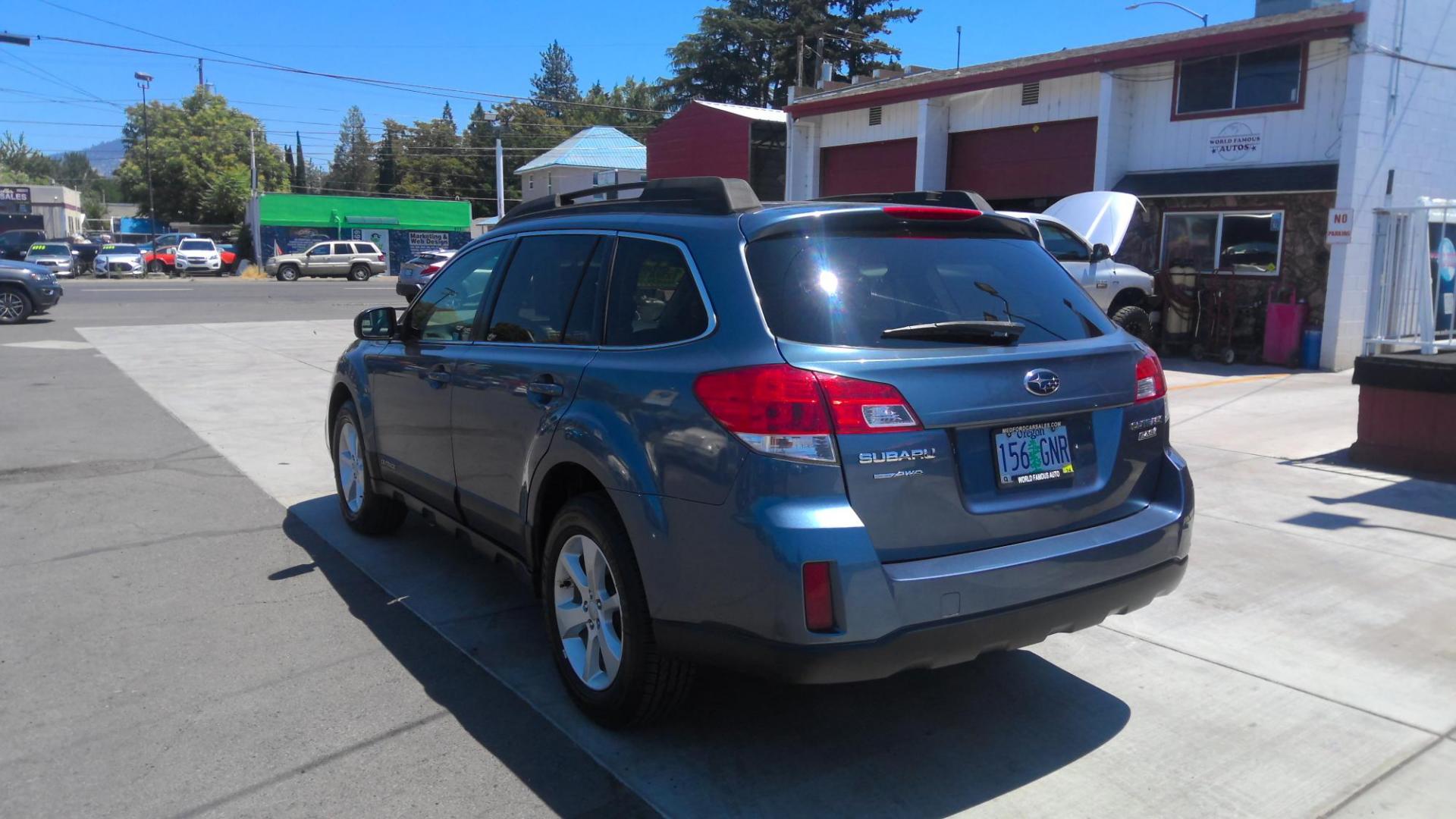 2013 BLUE Subaru Outback 2.5I Premium (4S4BRBCC2D1) with an 2.5L H4 DOHC 16V engine, located at 502 S. Riverside Avenue, Medford, OR, 97501, (541) 773-3136, 42.322803, -122.867477 - Photo#3