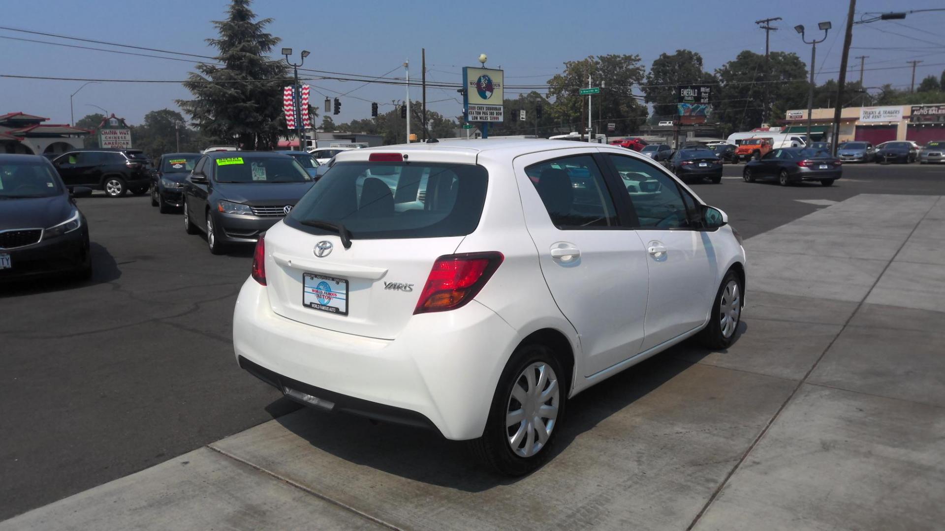 2015 WHITE Toyota Yaris LE 5-Door AT (VNKKTUD3XFA) with an 1.5L L4 DOHC 16V engine, 4-Speed Automatic transmission, located at 502 S. Riverside Avenue, Medford, OR, 97501, (541) 773-3136, 42.322803, -122.867477 - Photo#2