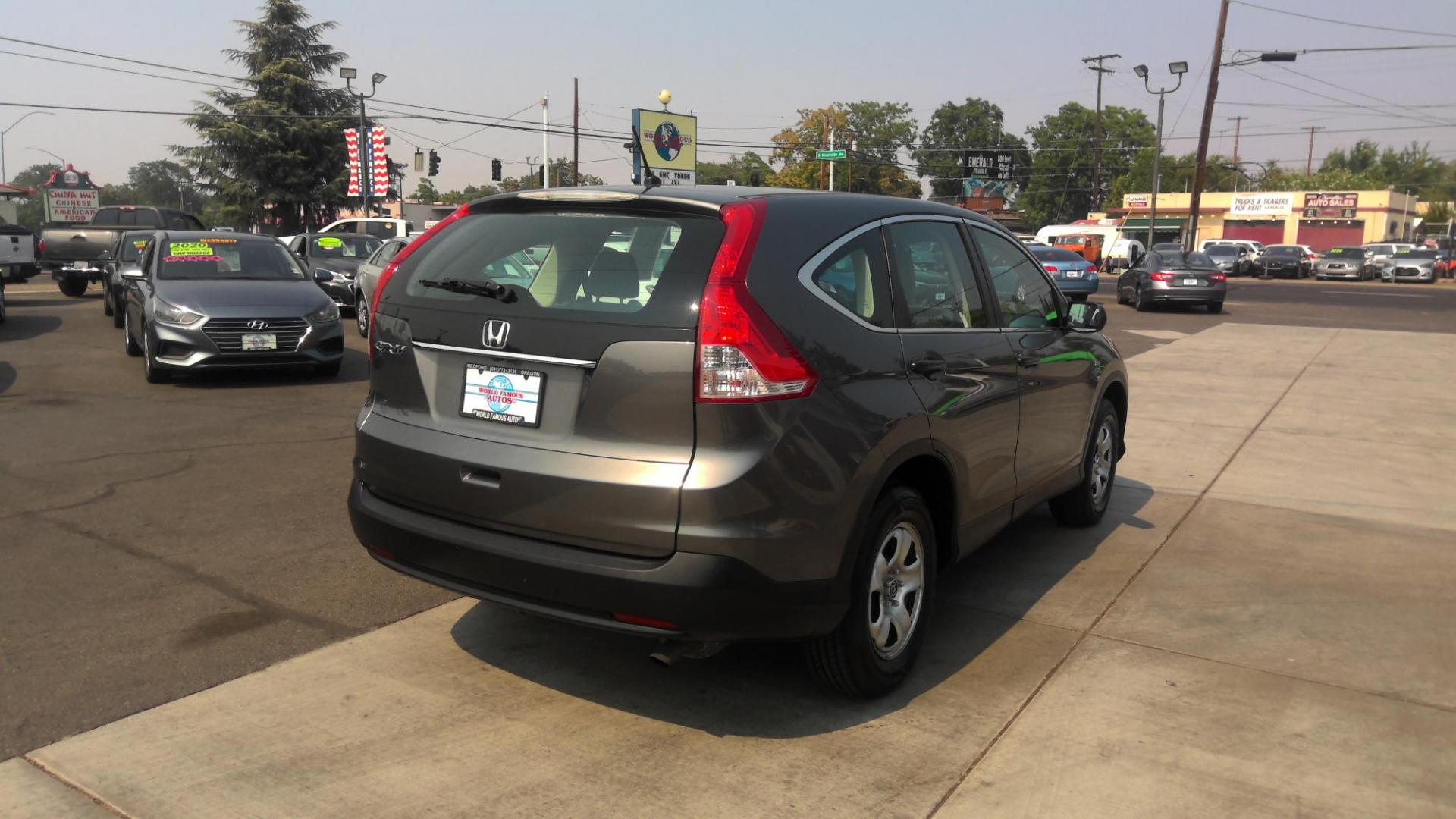 2013 GRAY Honda CR-V LX 2WD 5-Speed AT (3CZRM3H3XDG) with an 2.4L L4 DOHC 16V engine, 5-Speed Automatic transmission, located at 502 S. Riverside Avenue, Medford, OR, 97501, (541) 773-3136, 42.322803, -122.867477 - Photo#2