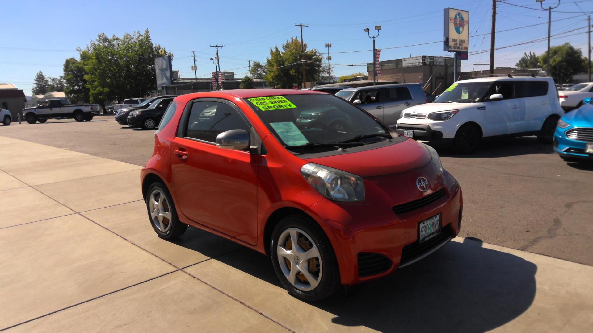 2014 ORANGE Scion iQ 3-Door Hatchback AT (JTNJJXB01EJ) with an 1.3L L4 engine, Continuously Variable Transmission transmission, located at 502 S. Riverside Avenue, Medford, OR, 97501, (541) 773-3136, 42.322803, -122.867477 - Photo#2