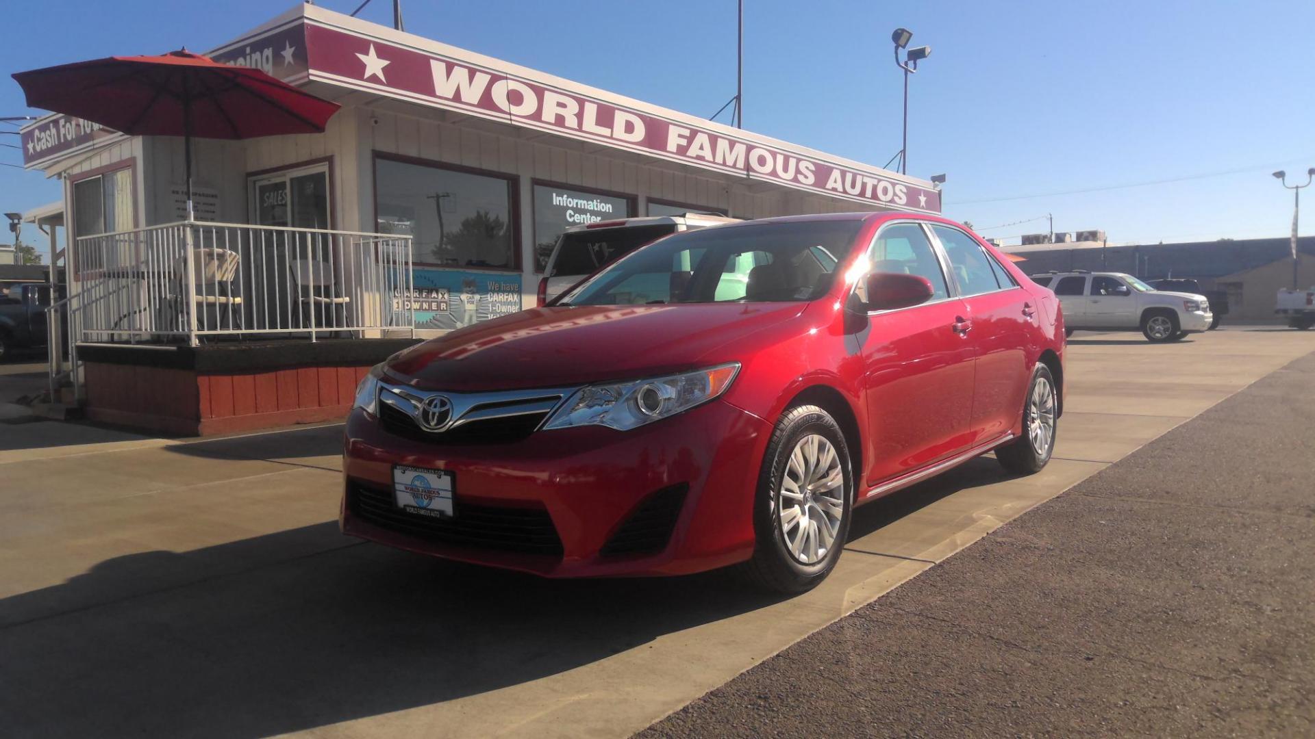 2014 RED Toyota Camry L (4T4BF1FK4ER) with an 2.5L L4 DOHC 16V engine, 6-Speed Automatic transmission, located at 502 S. Riverside Avenue, Medford, OR, 97501, (541) 773-3136, 42.322803, -122.867477 - Photo#0