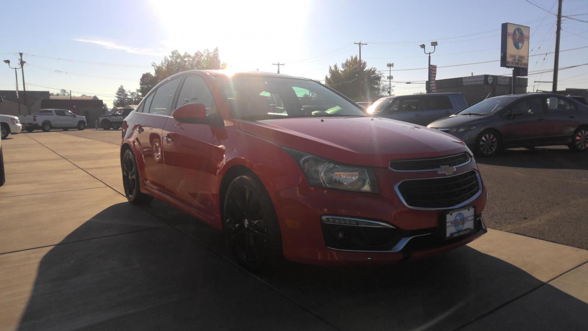 2015 RED Chevrolet Cruze LTZ Auto (1G1PG5SB1F7) with an 1.4L L4 DOHC 16V TURBO engine, 6-Speed Automatic transmission, located at 502 S. Riverside Avenue, Medford, OR, 97501, (541) 773-3136, 42.322803, -122.867477 - Photo#1