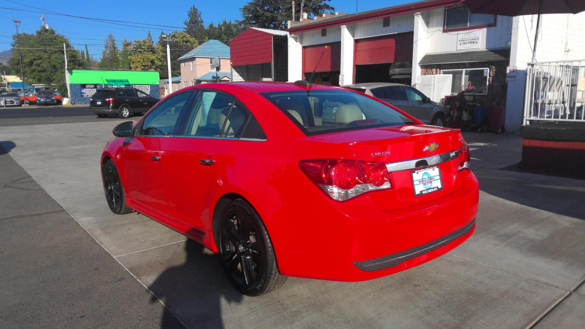 2015 RED Chevrolet Cruze LTZ Auto (1G1PG5SB1F7) with an 1.4L L4 DOHC 16V TURBO engine, 6-Speed Automatic transmission, located at 502 S. Riverside Avenue, Medford, OR, 97501, (541) 773-3136, 42.322803, -122.867477 - Photo#2