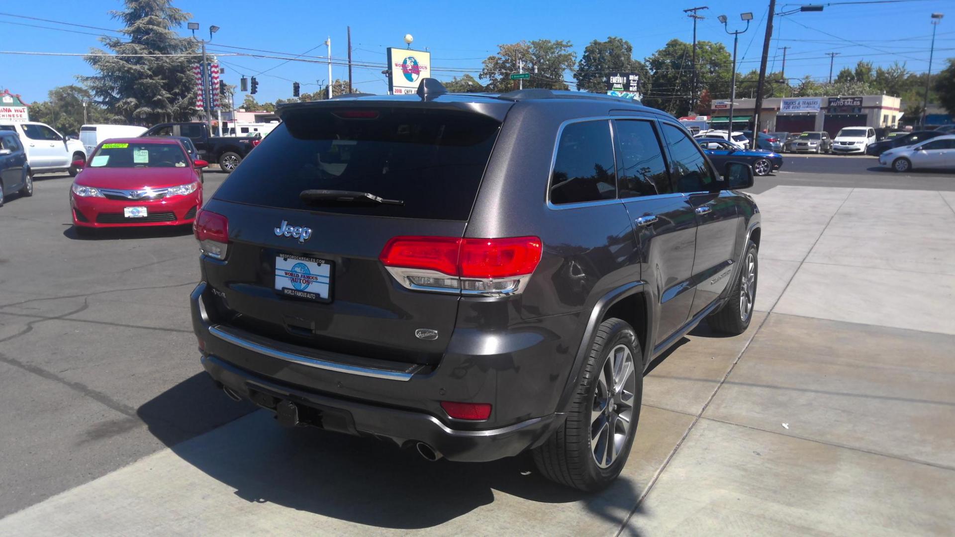 2017 GRAY Jeep Grand Cherokee Overland 4WD (1C4RJFCT1HC) with an 5.7L V8 OHV 16V engine, 8A transmission, located at 502 S. Riverside Avenue, Medford, OR, 97501, (541) 773-3136, 42.322803, -122.867477 - Photo#2