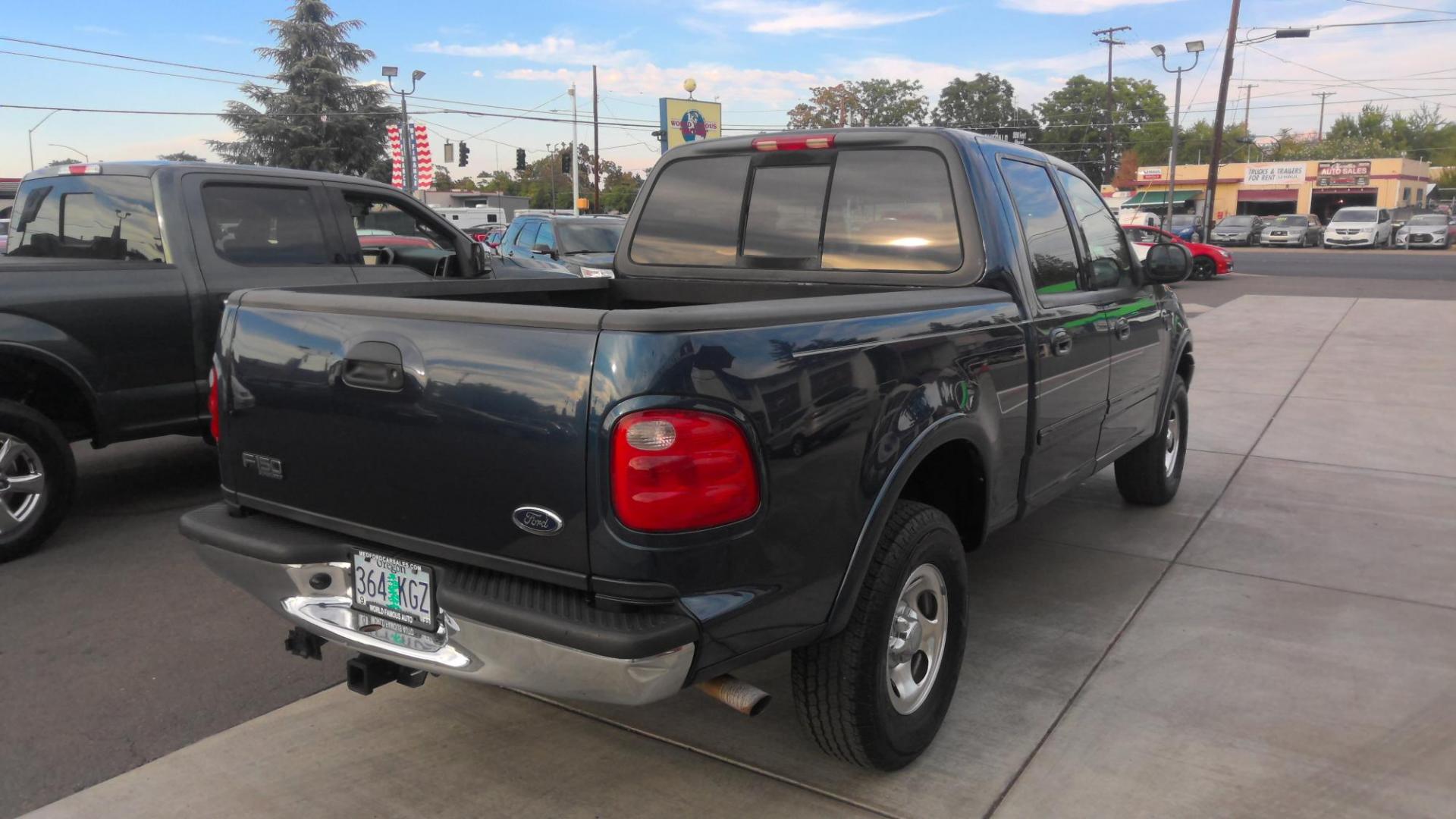 2002 BLUE Ford F-150 King Ranch SuperCrew Short Bed 4WD (1FTRW08L72K) with an 5.4L V8 SOHC 16V engine, 4-Speed Automatic Overdrive transmission, located at 502 S. Riverside Avenue, Medford, OR, 97501, (541) 773-3136, 42.322803, -122.867477 - Photo#2