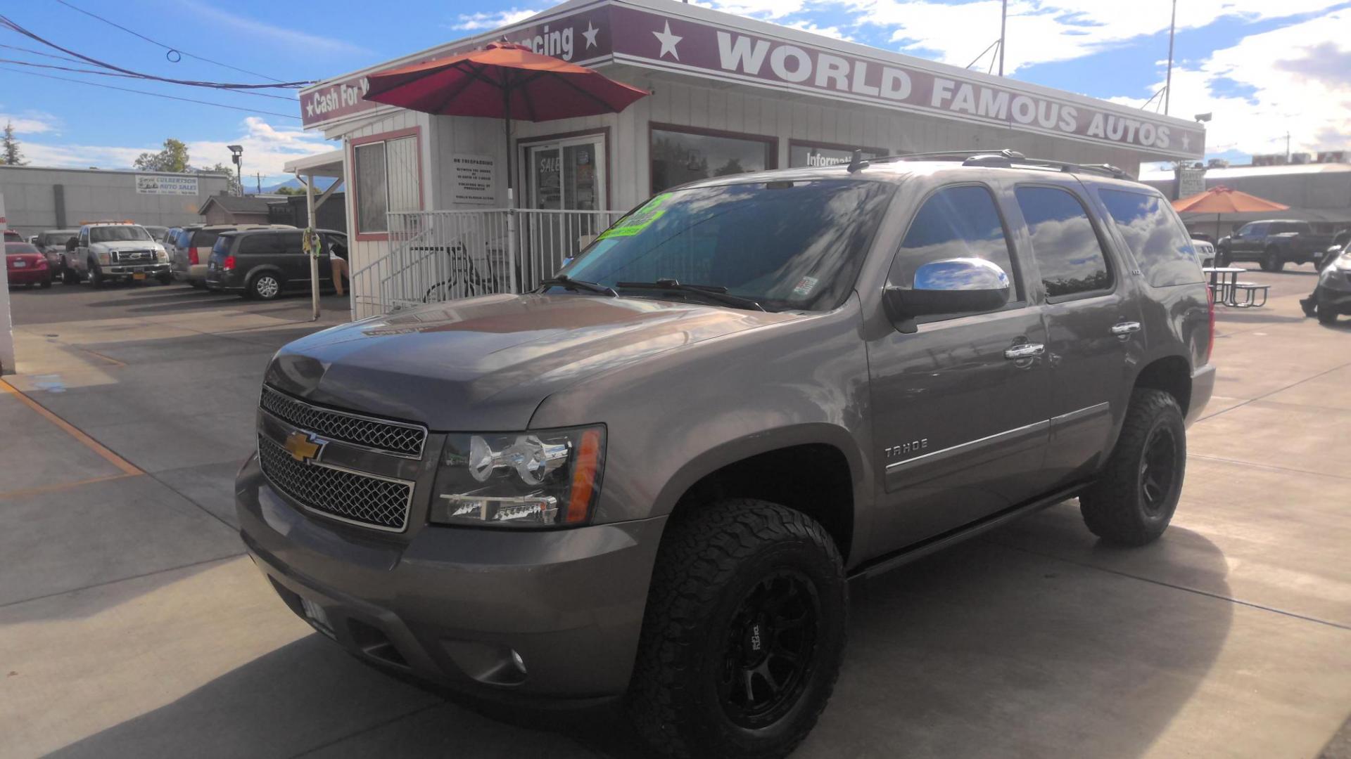 2013 BROWN Chevrolet Tahoe LTZ 4WD (1GNSKCE02DR) with an 5.3L V8 OHV 16V FFV engine, 6-Speed Automatic transmission, located at 502 S. Riverside Avenue, Medford, OR, 97501, (541) 773-3136, 42.322803, -122.867477 - Photo#0