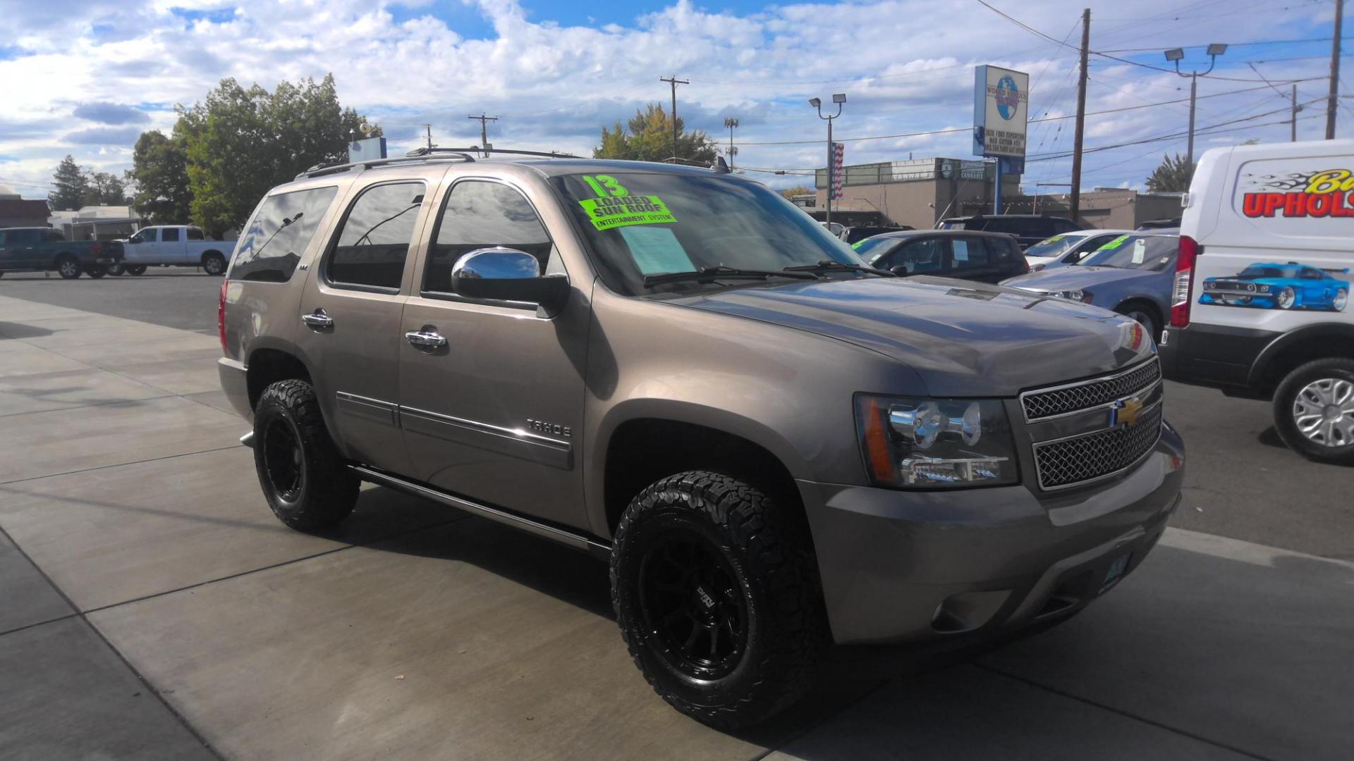 2013 BROWN Chevrolet Tahoe LTZ 4WD (1GNSKCE02DR) with an 5.3L V8 OHV 16V FFV engine, 6-Speed Automatic transmission, located at 502 S. Riverside Avenue, Medford, OR, 97501, (541) 773-3136, 42.322803, -122.867477 - Photo#1