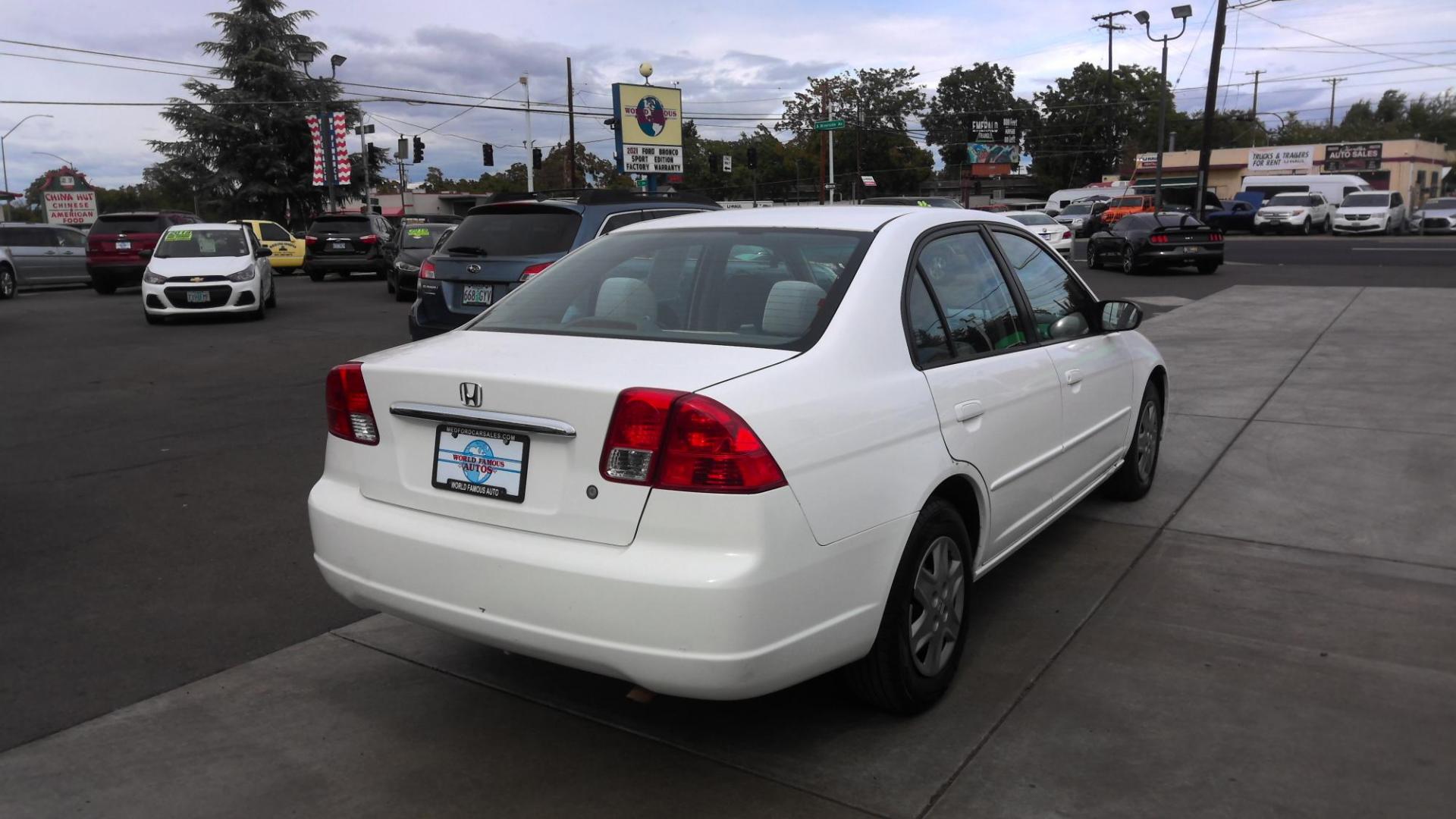 2003 WHITE Honda Civic LX Sedan 4-spd AT with Front Side Airbags (2HGES16653H) with an 1.7L L4 SOHC 16V engine, 4-Speed Automatic Overdrive transmission, located at 502 S. Riverside Avenue, Medford, OR, 97501, (541) 773-3136, 42.322803, -122.867477 - Photo#2