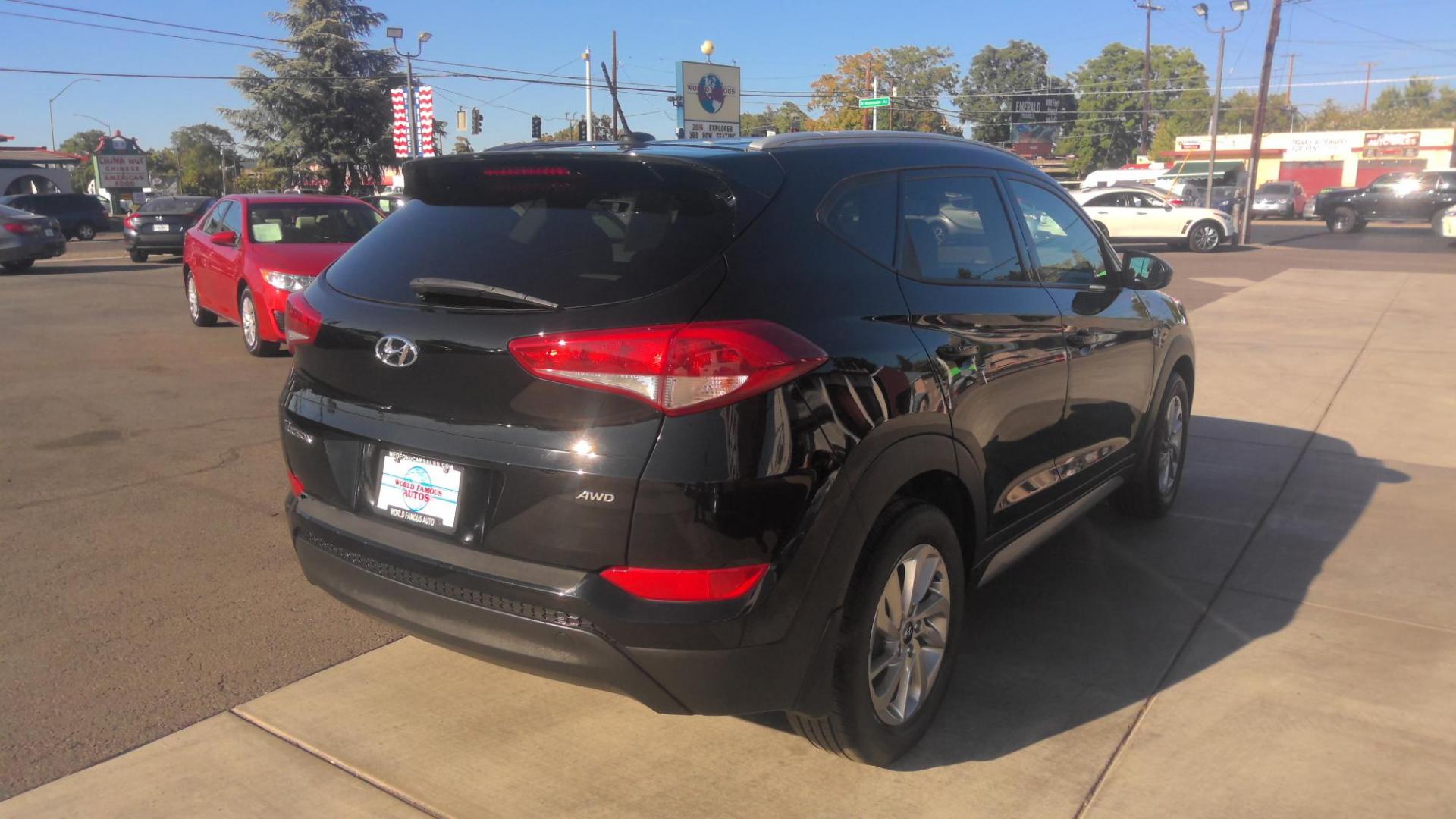 2017 BLACK Hyundai Tucson SE w/Preferred Package AWD (KM8J3CA48HU) with an 2.0L L4 DOHC 16V engine, 6A transmission, located at 502 S. Riverside Avenue, Medford, OR, 97501, (541) 773-3136, 42.322803, -122.867477 - Photo#2