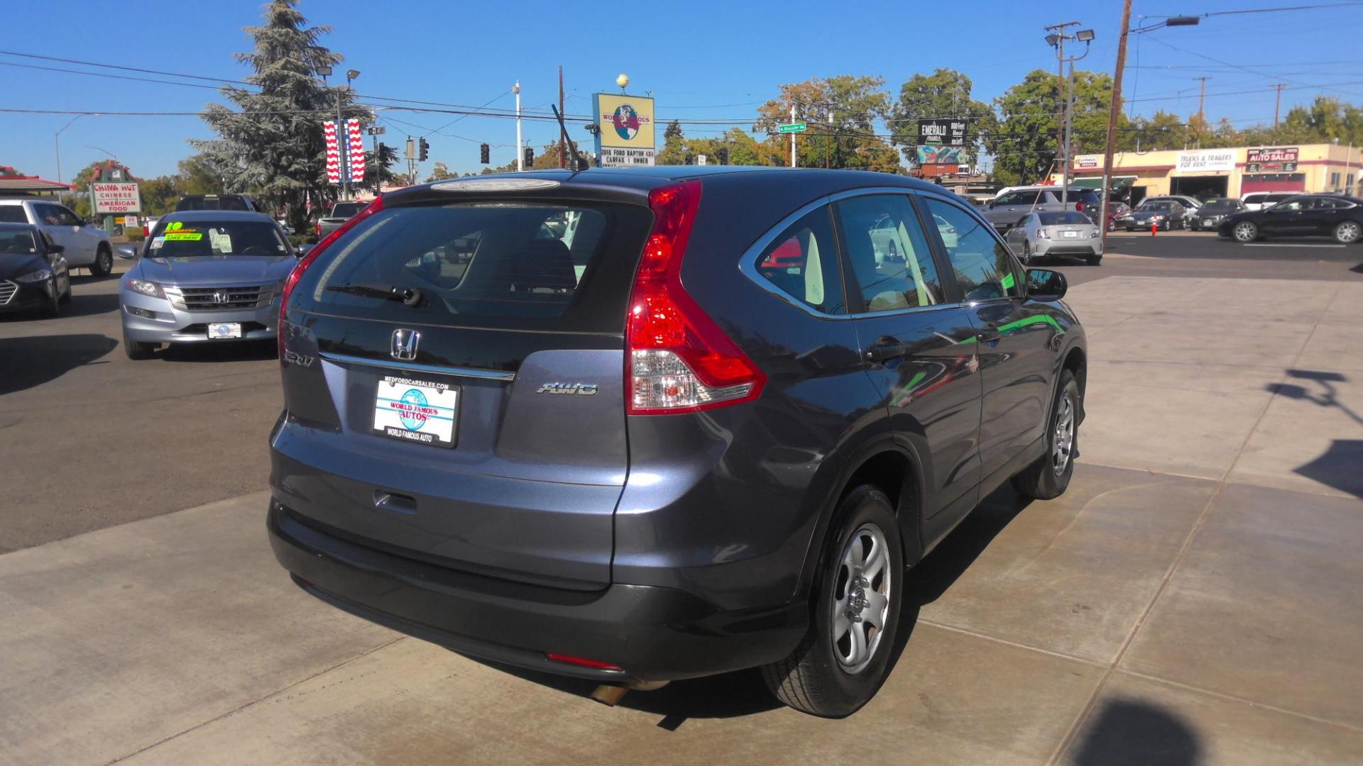 2012 BLUE Honda CR-V LX 4WD 5-Speed AT (5J6RM4H38CL) with an 2.4L L4 DOHC 16V engine, 5-Speed Automatic transmission, located at 502 S. Riverside Avenue, Medford, OR, 97501, (541) 773-3136, 42.322803, -122.867477 - Photo#1