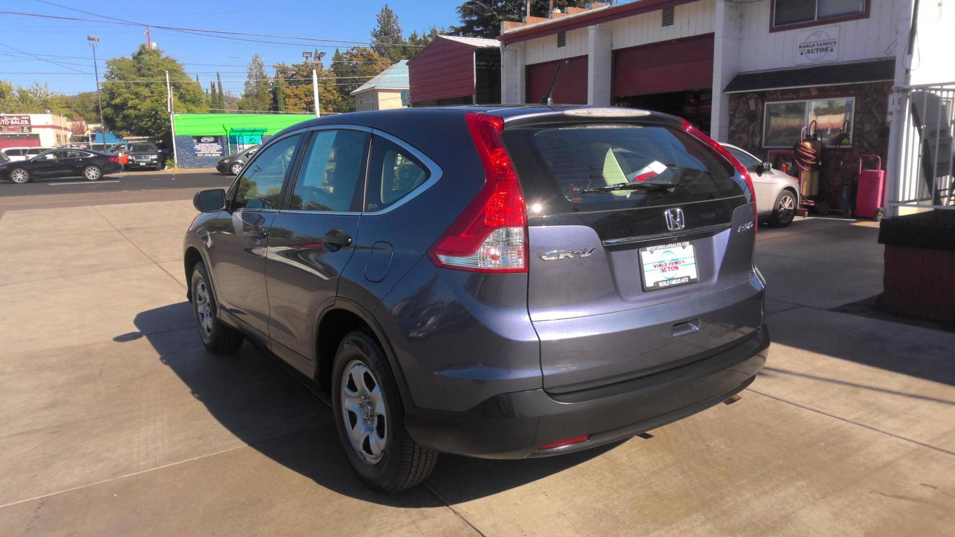 2012 BLUE Honda CR-V LX 4WD 5-Speed AT (5J6RM4H38CL) with an 2.4L L4 DOHC 16V engine, 5-Speed Automatic transmission, located at 502 S. Riverside Avenue, Medford, OR, 97501, (541) 773-3136, 42.322803, -122.867477 - Photo#4