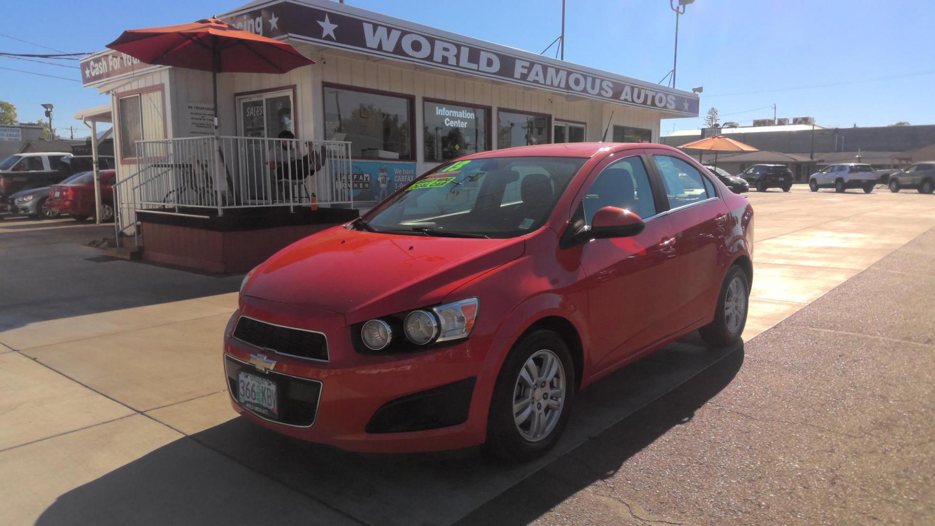 2013 ORANGE Chevrolet Sonic LT Auto Sedan (1G1JC5SB2D4) with an 1.4L L4 DOHC 24V TURBO FFV engine, 6-Speed Automatic transmission, located at 502 S. Riverside Avenue, Medford, OR, 97501, (541) 773-3136, 42.322803, -122.867477 - Photo#0