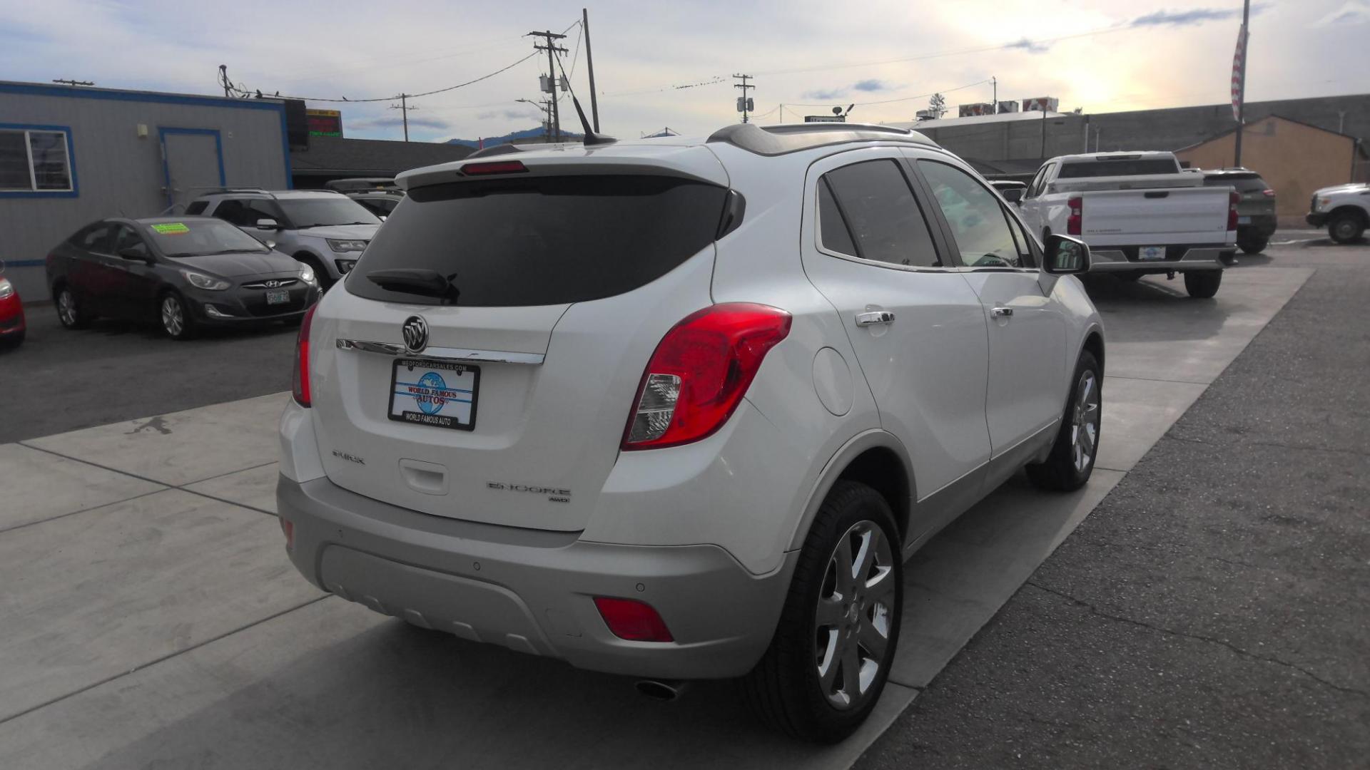 2013 WHITE Buick Encore Premium AWD (KL4CJHSB6DB) with an 1.4L L4 DOHC 16V TURBO engine, 6-Speed Automatic transmission, located at 502 S. Riverside Avenue, Medford, OR, 97501, (541) 773-3136, 42.322803, -122.867477 - Photo#3