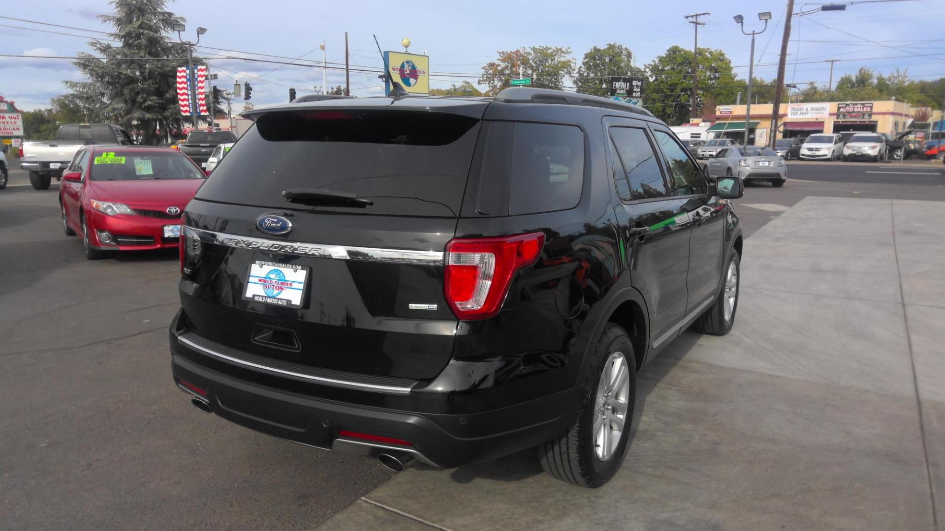 2018 BLACK Ford Explorer XLT 4WD (1FM5K8DH0JG) with an 2.3L L4 DOHC 16V engine, 6A transmission, located at 502 S. Riverside Avenue, Medford, OR, 97501, (541) 773-3136, 42.322803, -122.867477 - Photo#2